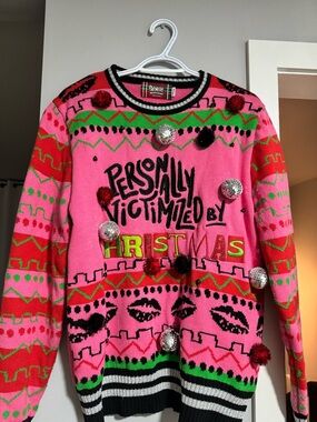 Sensual Pop Pink 'Personally Victimized by Christmas' Sweater